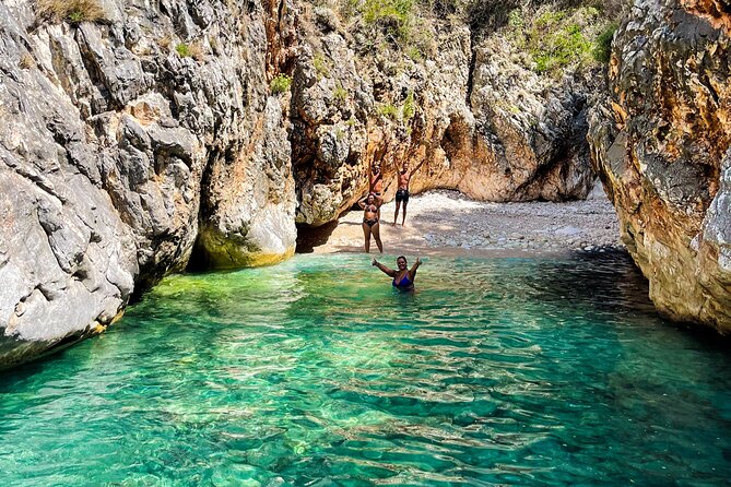 Blue Cave & Grama Bay Full Day Guided Boat Tour - Llovizi Beach, a secretive coastal break