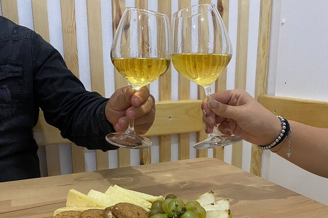 Farm-to-Table Cooking Class with Local Family by 1001 AlbAdv - Wine, cheese, olives, and bread near Berat