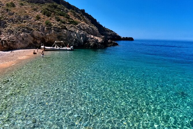 Private Full Day Boat Expedition to Grama Bay - Dafina Beach and the short swim to Dafina Cave