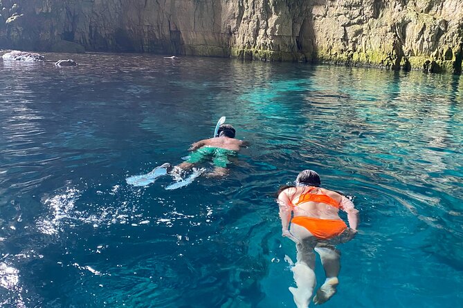 Private Full Day Boat Expedition to Grama Bay - Llovizi Bay and the Blue Seal Monk Cave