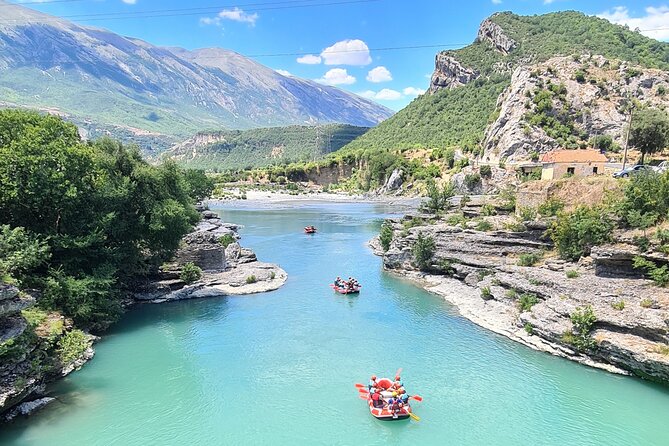 Rafting Tour in Vjosa Wild River National Park - Rock walls, rounded stones, and changing river views