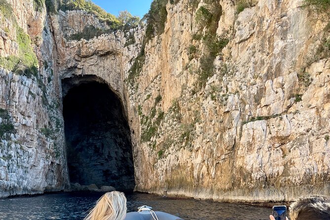 Secret Blue Gem Cave & Grama Bay Boat Tours Vlore - Grama Bay, inscriptions, and the day’s best stop