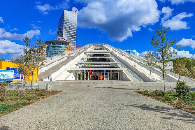 Tirana Bike Tour, History, Culture and Visit to Artificial Lake - Grand Park and the artificial lake slow the pace