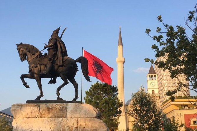 Tirana Express Walking Tour - Essential of the Albanian Capital - Komiteti Bar makes communist history personal