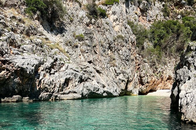 Vlore| Full Day Guided Tour to Grama Bay and Marine Park - Plazhi i Llovizit adds a small history stop